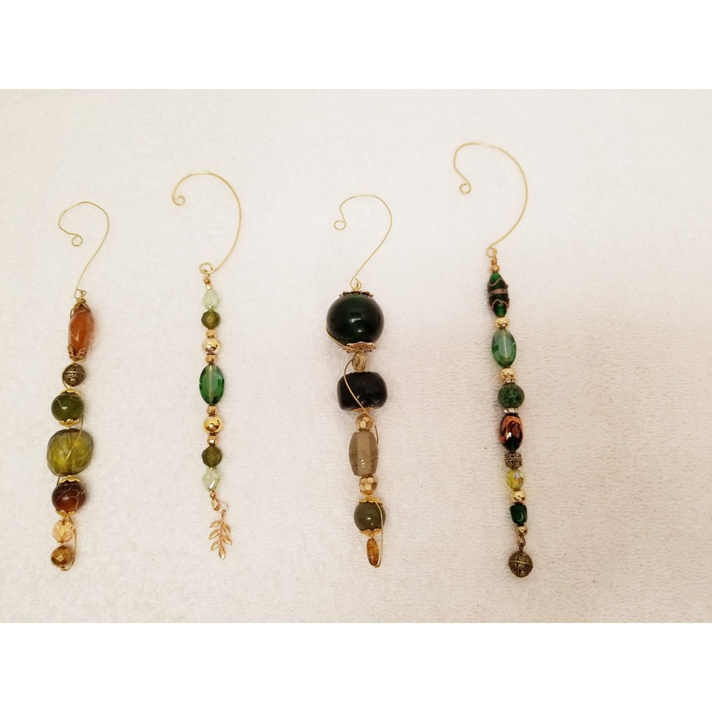 Four green and gold Christmas icicle ornaments c7